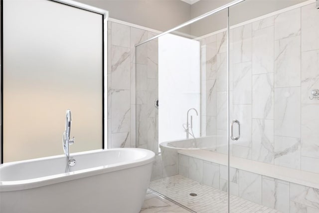 209 Ringtail Stream Dr, Lakeway, TX 78738 - full bathroom with marble look tiles, a stall shower, and a freestanding bath