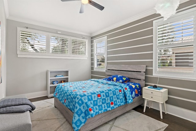 209 Ringtail Stream Dr, Lakeway, TX 78738 - bedroom with crown molding, multiple windows, a ceiling fan, and wood finished floors