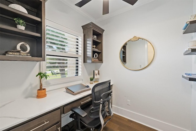 209 Ringtail Stream Dr, Lakeway, TX 78738 - home office with dark wood-type flooring, crown molding, ceiling fan, and built in study area