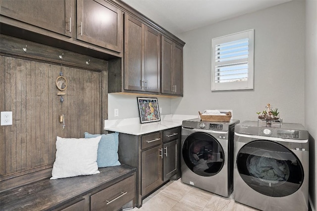 209 Ringtail Stream Dr, Lakeway, TX 78738 - laundry area with cabinet space and washer and clothes dryer