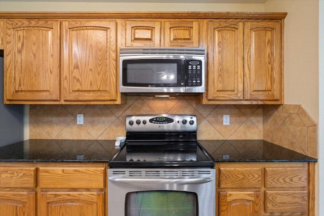 2802 Amber Forest Trl, Belton, TX 76513 - kitchen with stainless steel appliances, decorative backsplash, and brown cabinetry