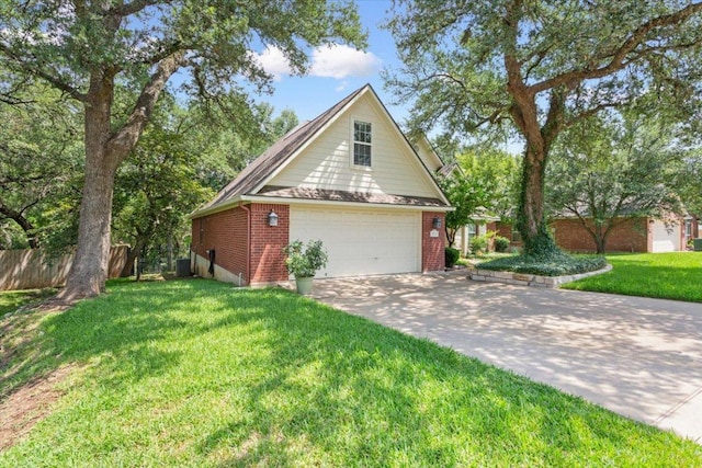 2802 Amber Forest Trl, Belton, TX 76513 - view of side of home with a garage, brick siding, and driveway