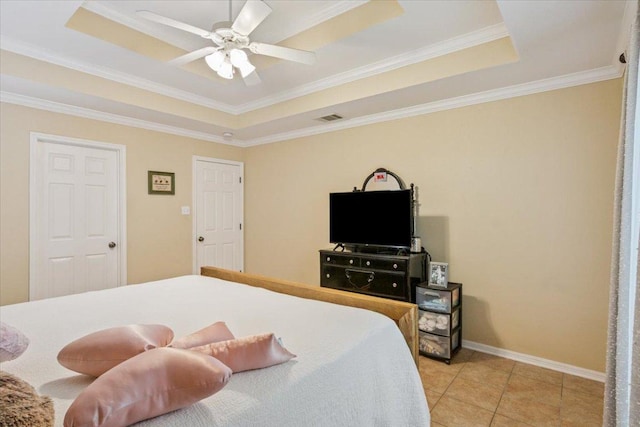 2802 Amber Forest Trl, Belton, TX 76513 - bedroom with a raised ceiling, crown molding, and light tile patterned floors