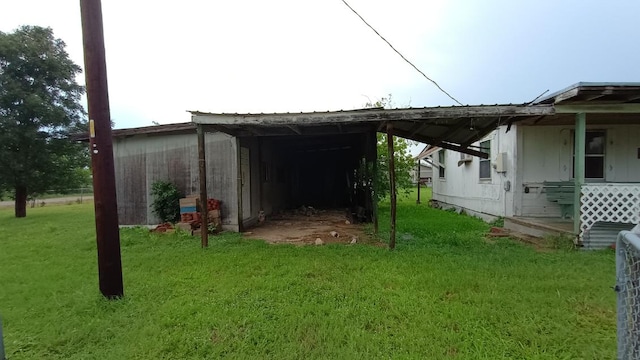 18016 Morrow St, Elgin, TX 78621 - view of outbuilding featuring a carport
