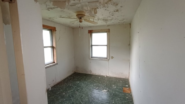 18016 Morrow St, Elgin, TX 78621 - empty room with healthy amount of natural light and ceiling fan