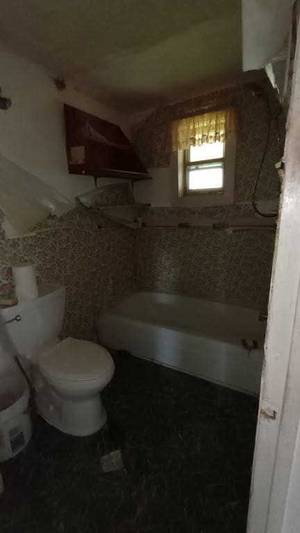 18016 Morrow St, Elgin, TX 78621 - bathroom featuring a tub and tile walls