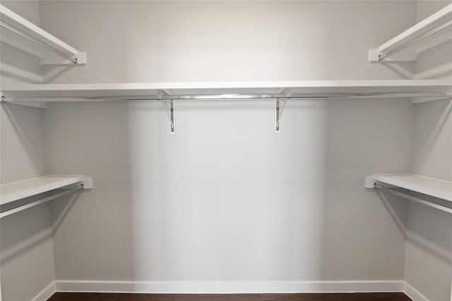 4510 Terry-O Ln Unit 322, Austin, TX 78745 - walk in closet featuring dark wood-type flooring