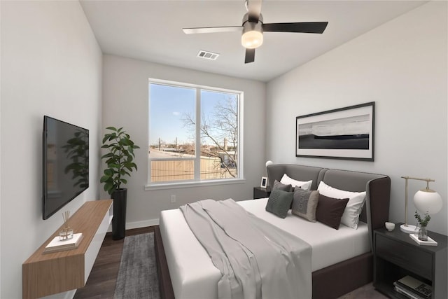 4510 Terry-O Ln Unit 322, Austin, TX 78745 - bedroom with dark wood-type flooring and a ceiling fan
