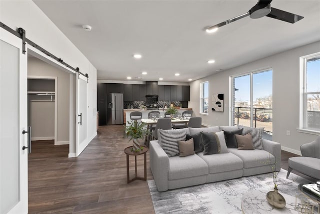 4510 Terry-O Ln Unit 322, Austin, TX 78745 - living room with a barn door, ceiling fan, dark wood finished floors, and recessed lighting