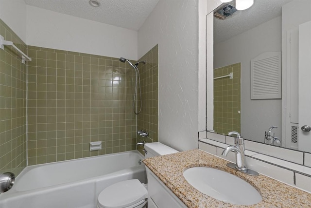 2616 Audubon Pl, Austin, TX 78741 - bathroom featuring a textured ceiling, shower / bath combination, vanity, and a textured wall