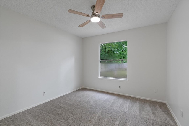 2616 Audubon Pl, Austin, TX 78741 - carpeted empty room featuring a textured ceiling and ceiling fan
