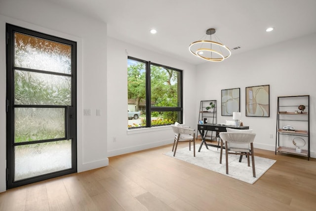 3005 French Pl, Austin, TX 78722 - office space featuring wood finished floors, a chandelier, and recessed lighting
