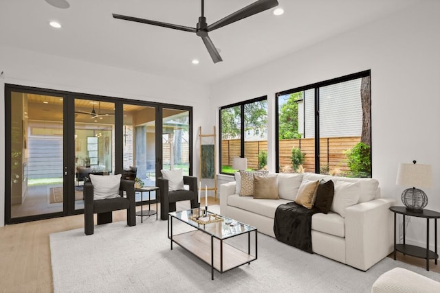 3005 French Pl, Austin, TX 78722 - living room featuring ceiling fan, recessed lighting, and light wood-type flooring