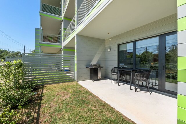4004 Banister Ln Unit 105, Austin, TX 78704 - view of yard featuring a patio area and french doors