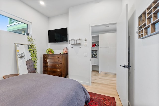 4004 Banister Ln Unit 105, Austin, TX 78704 - bedroom featuring wood finished floors and recessed lighting