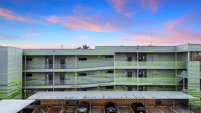 4004 Banister Ln Unit 105, Austin, TX 78704 - view of property featuring covered parking