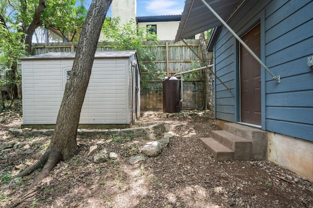 1703 Graywood Cv, Austin, TX 78704 - view of yard with entry steps and a storage unit