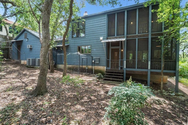 1703 Graywood Cv, Austin, TX 78704 - back of house featuring a sunroom