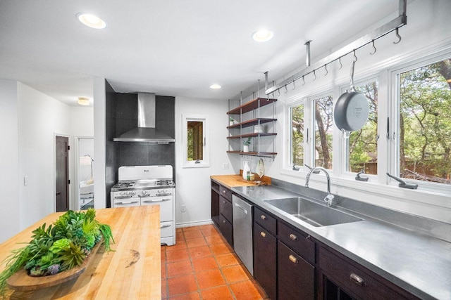 1703 Graywood Cv, Austin, TX 78704 - kitchen with butcher block counters, wall chimney range hood, double oven range, stainless steel dishwasher, and open shelves