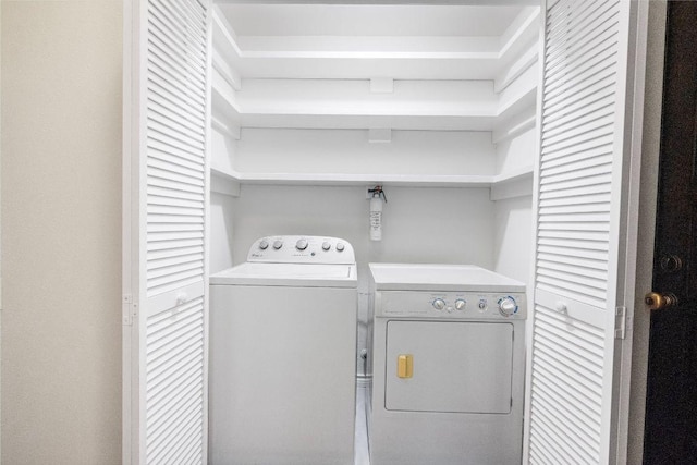 1703 Graywood Cv, Austin, TX 78704 - laundry room featuring washer and clothes dryer