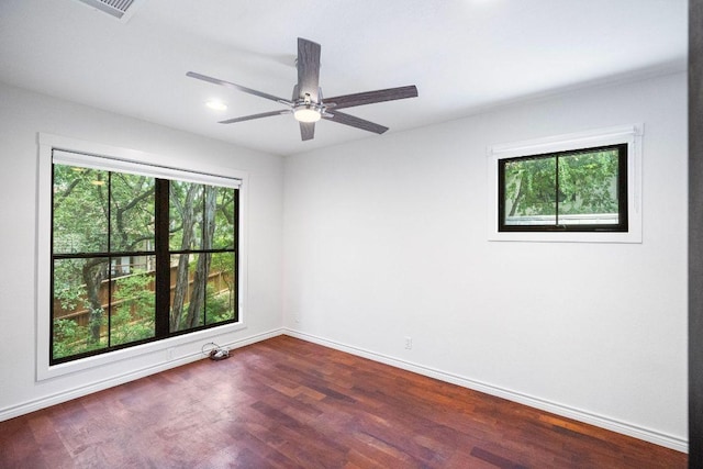 1703 Graywood Cv, Austin, TX 78704 - unfurnished room with plenty of natural light, dark wood-style floors, ceiling fan, and recessed lighting