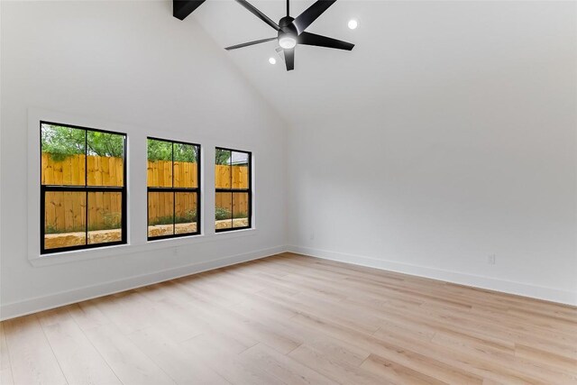 837 Birch Ln, Cottonwood Shores, TX 78657 - unfurnished room featuring high vaulted ceiling, ceiling fan, light wood finished floors, recessed lighting, and beamed ceiling