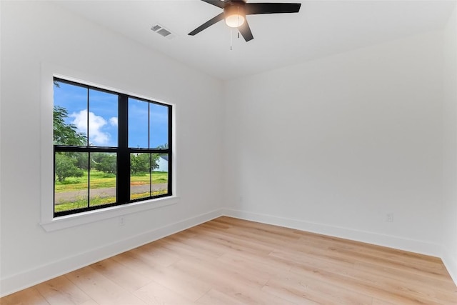 837 Birch Ln, Cottonwood Shores, TX 78657 - empty room featuring light wood-style floors and a ceiling fan