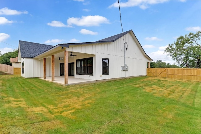 837 Birch Ln, Cottonwood Shores, TX 78657 - rear view of house featuring ceiling fan, roof with shingles, a patio area, and board and batten siding