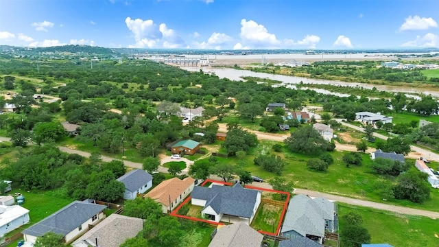 837 Birch Ln, Cottonwood Shores, TX 78657 - aerial view of residential area with property boundaries highlighted and a nearby body of water