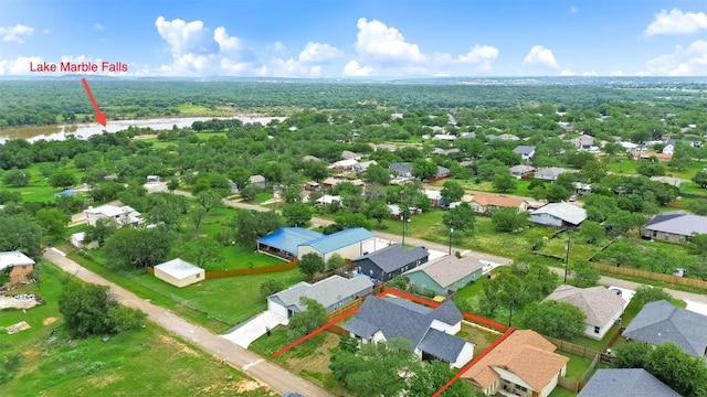 837 Birch Ln, Cottonwood Shores, TX 78657 - aerial perspective of suburban area with a nearby body of water and property parcel outlined