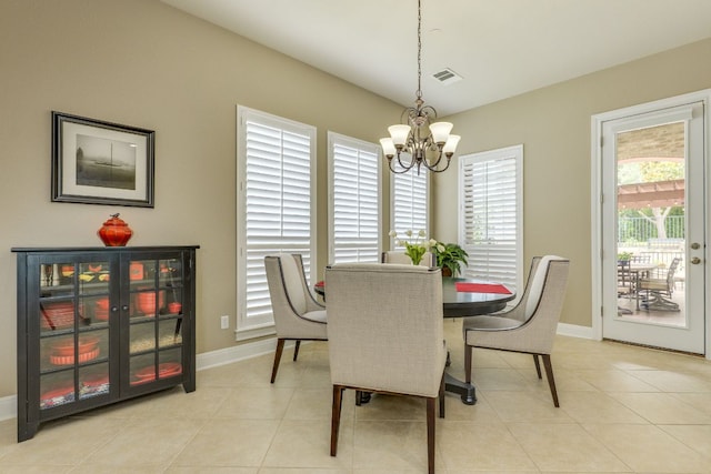 117 N Whitley Dr, Austin, TX 78738 - dining space featuring a chandelier, french doors, and light tile patterned floors