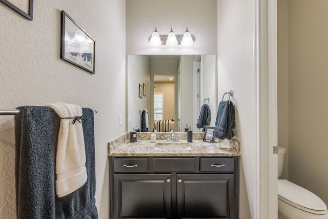 117 N Whitley Dr, Austin, TX 78738 - bathroom featuring vanity and toilet