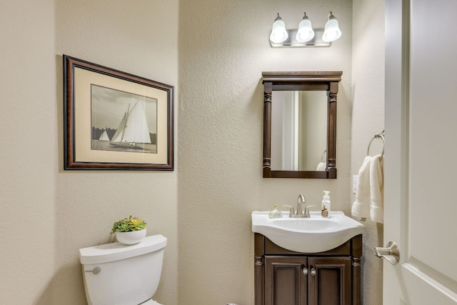 117 N Whitley Dr, Austin, TX 78738 - half bathroom featuring toilet and vanity