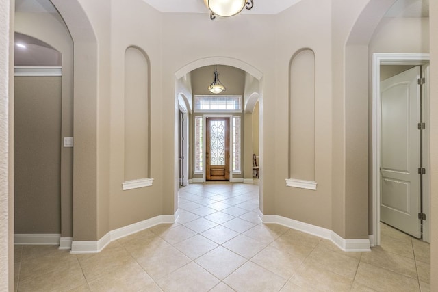 117 N Whitley Dr, Austin, TX 78738 - entrance foyer with light tile patterned floors and baseboards