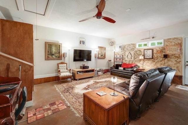210 Buoy Cir, Georgetown, TX 78633 - living room with attic access, concrete flooring, and ceiling fan