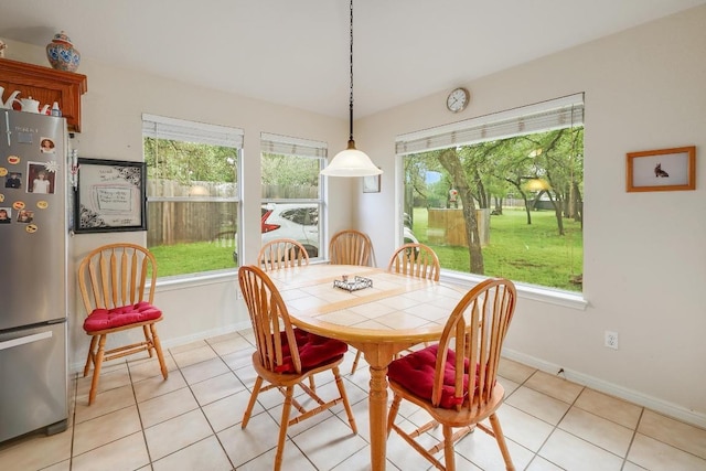210 Buoy Cir, Georgetown, TX 78633 - dining room with healthy amount of natural light and light tile patterned flooring
