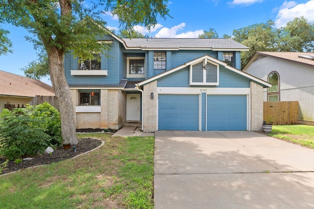 1102 Forest Oaks Path, Cedar Park, TX 78613 - traditional-style house featuring concrete driveway, brick siding, a garage, and a shingled roof