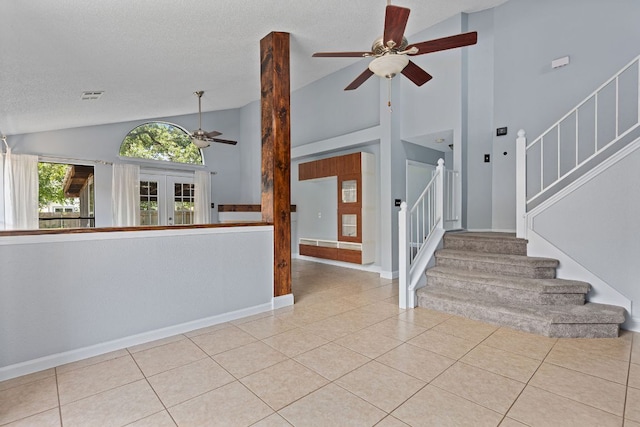 1102 Forest Oaks Path, Cedar Park, TX 78613 - tiled foyer entrance featuring ceiling fan, a textured ceiling, stairs, and high vaulted ceiling