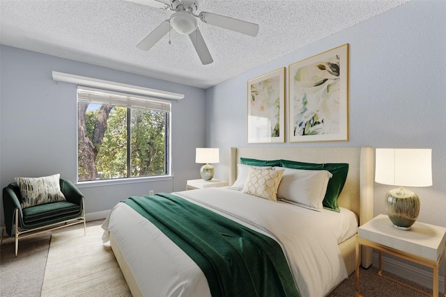 1102 Forest Oaks Path, Cedar Park, TX 78613 - bedroom with carpet floors, a textured ceiling, and a ceiling fan