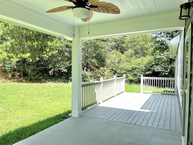 108 W Keamuku Ct, Bastrop, TX 78602 - deck featuring ceiling fan and a yard