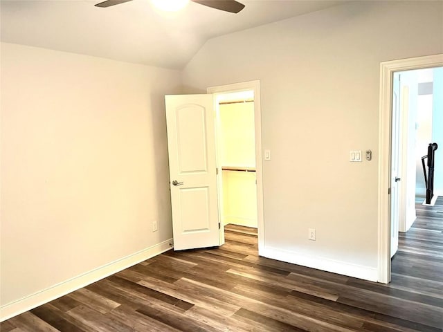 108 W Keamuku Ct, Bastrop, TX 78602 - spare room featuring ceiling fan, vaulted ceiling, and dark wood-style flooring