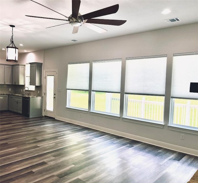 108 W Keamuku Ct, Bastrop, TX 78602 - kitchen with gray cabinetry, dark wood-style floors, a ceiling fan, pendant lighting, and recessed lighting