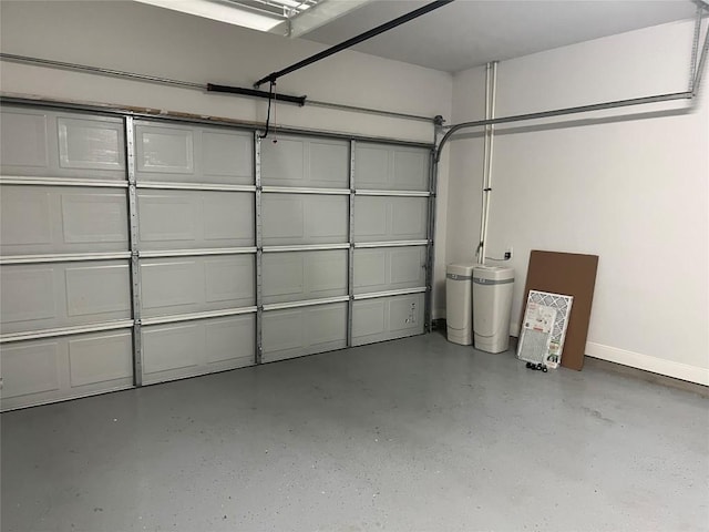 108 W Keamuku Ct, Bastrop, TX 78602 - garage with baseboards