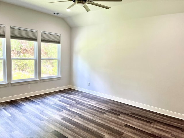 108 W Keamuku Ct, Bastrop, TX 78602 - unfurnished room featuring a ceiling fan, dark wood-style floors, and vaulted ceiling
