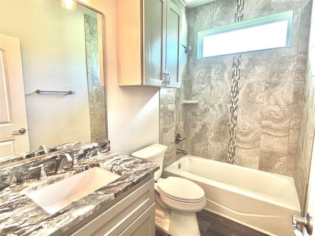108 W Keamuku Ct, Bastrop, TX 78602 - full bathroom with vanity, wood finished floors, and  shower combination