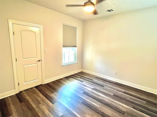 108 W Keamuku Ct, Bastrop, TX 78602 - unfurnished room featuring a ceiling fan and dark wood-style floors