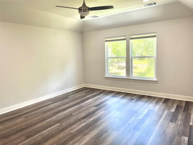 108 W Keamuku Ct, Bastrop, TX 78602 - unfurnished room featuring dark wood finished floors, lofted ceiling, and a ceiling fan