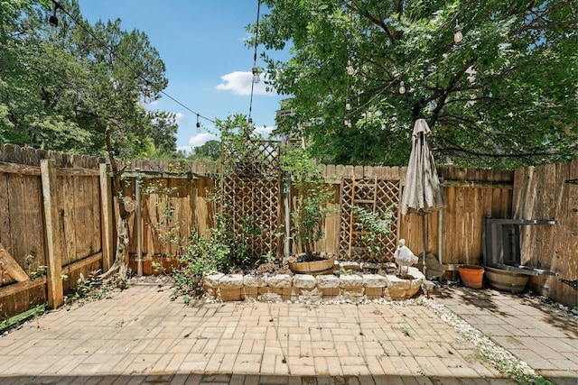 2520 Bluebonnet Ln Unit 48, Austin, TX 78704 - fenced backyard featuring a patio area