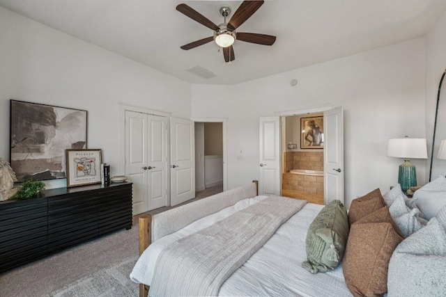 2520 Bluebonnet Ln Unit 48, Austin, TX 78704 - carpeted bedroom featuring a ceiling fan, a closet, and ensuite bathroom