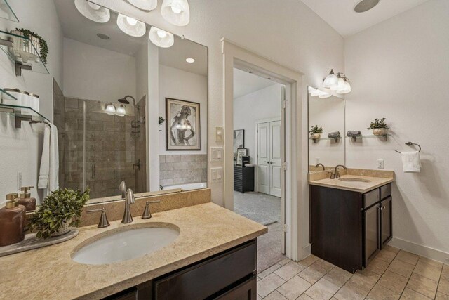 2520 Bluebonnet Ln Unit 48, Austin, TX 78704 - bathroom with vanity, a stall shower, a bath, and tile patterned flooring